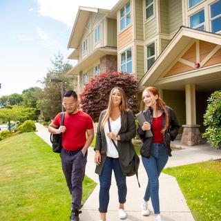 Students Walking outside of apartment building 